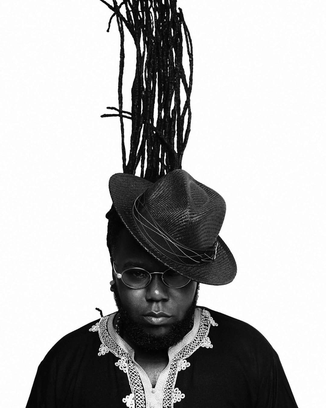 Editorial portrait photographer Jacksonville FL — black and white locs fedora studio portrait by HiDef Pixel